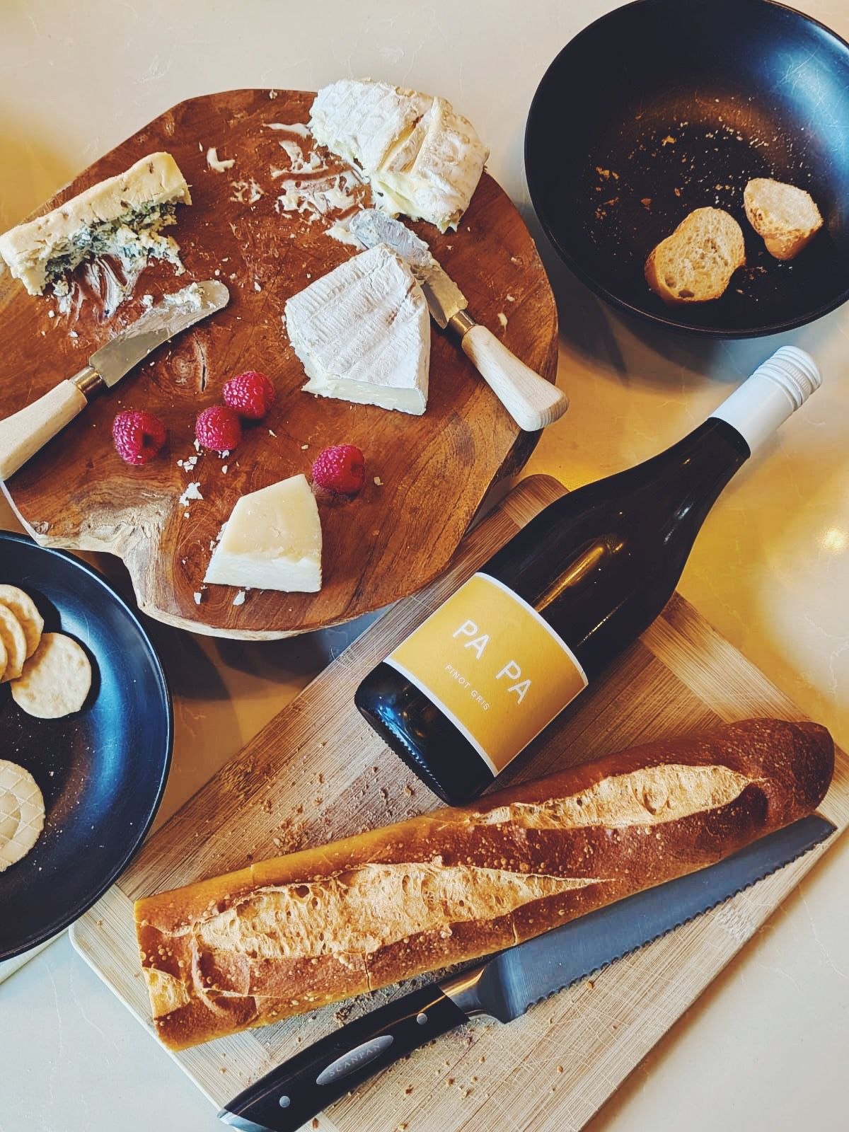 PA PA Pinot Gris with cheese, bread and snacks