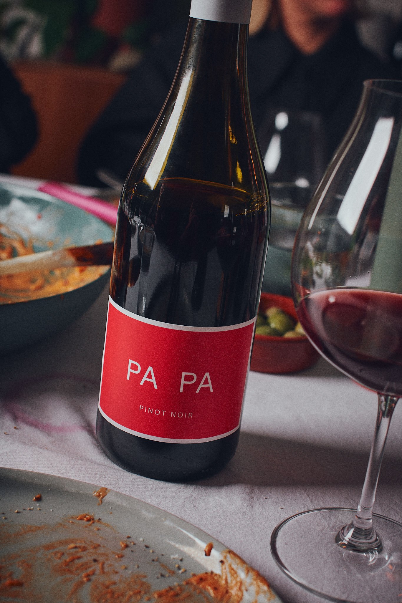 PA PA bottles with olives and tomatoes